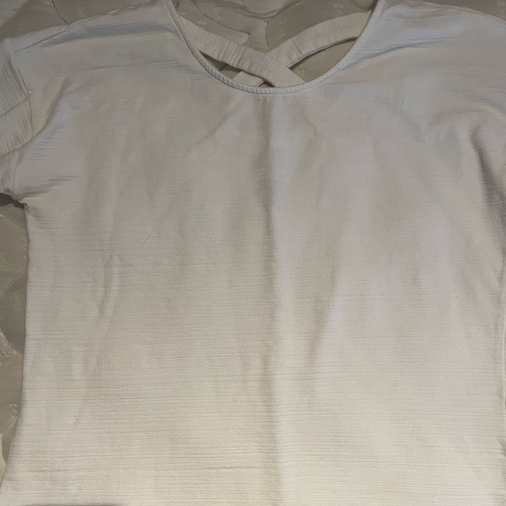 45. White long sleeve top, not thick like a sweater